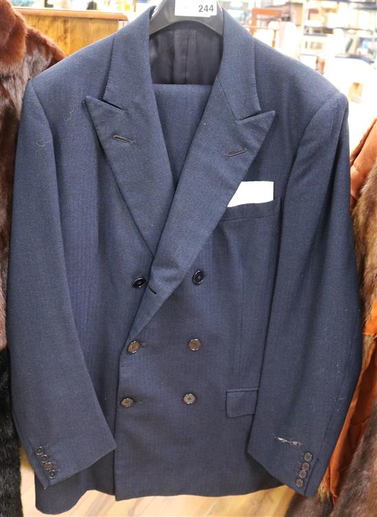 A mens navy vintage suit